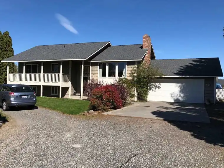 Covered deck under a roof tied into the house